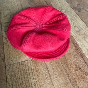 Red newsboy cap